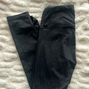 Spotted leggings in black/dark grey. Size Medium.